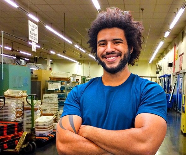 Smiling postal service employee